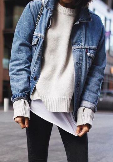Woman wearing a blue Denim Jacket Over A Sweater/Knitted Cardigan And Turtleneck